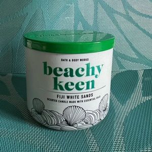 Bath & Body Works “Beachy Keen” candle.  Scent is Fiji White Sands.  New in box.